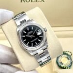 Rolex Datejust 31 mm 178274 pour femme, cadran noir bâton, boîte Oyster cannelée