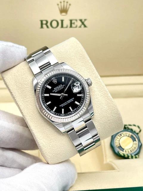 IMG-20251008-WA0247.jpg Rolex Datejust 31 mm 178274 pour femme, cadran noir bâton, boîte Oyster cannelée – Image 1