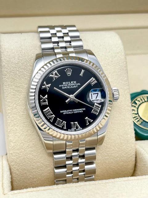 IMG-20251008-WA0296.jpg Montre Rolex Datejust 31 mm pour femme, cadran noir cannelé, 178274, boîte et papiers – Image 1